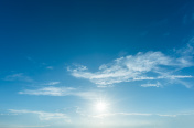 sun with sunlight in cloud on blue sky