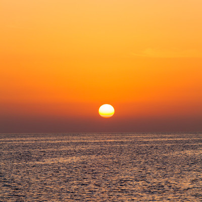 colorful sunset over water surf