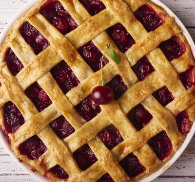close-up view of delicious homemade cherry pie with a flaky